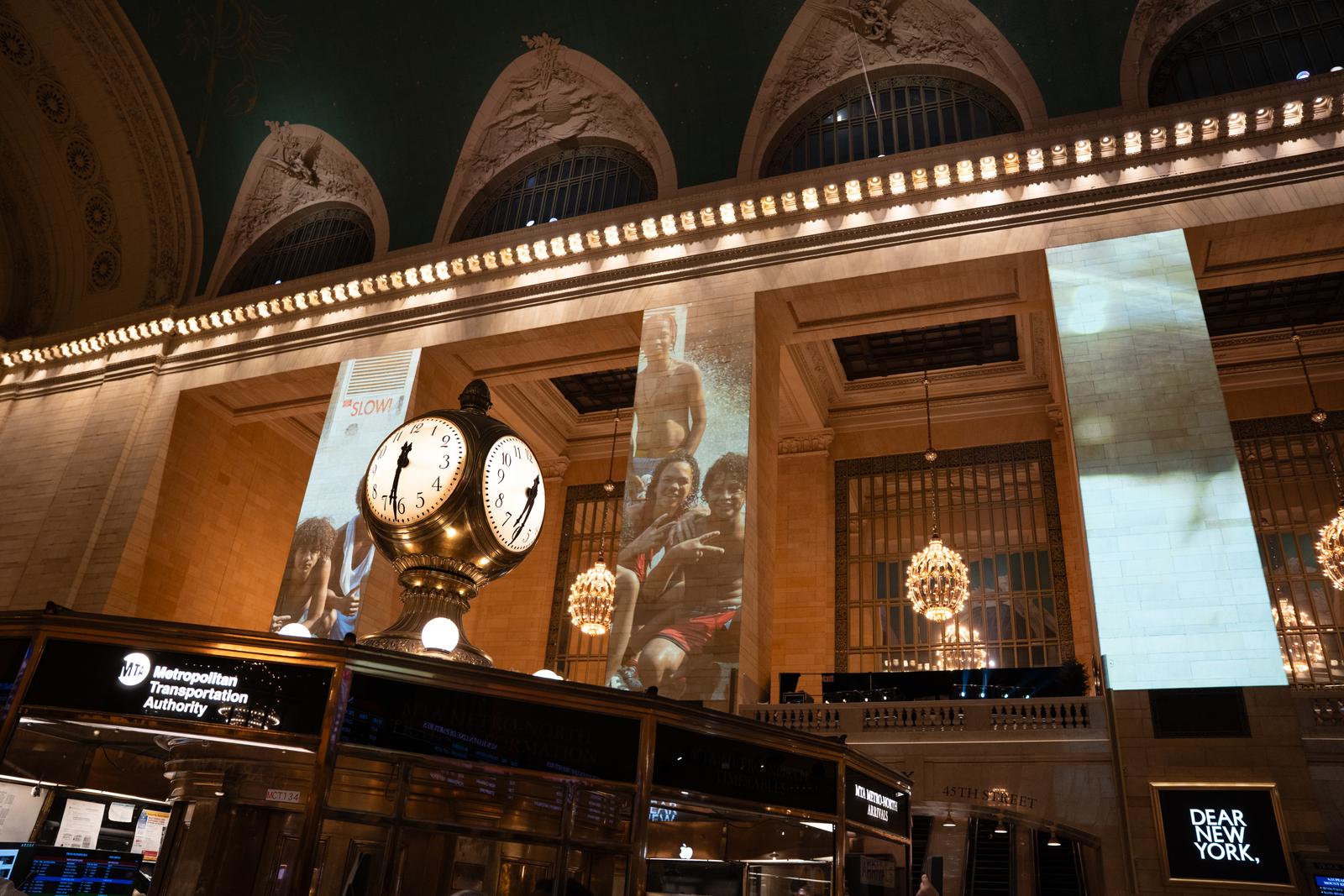 An eight‑channel projection loop covered every column in the concourse.