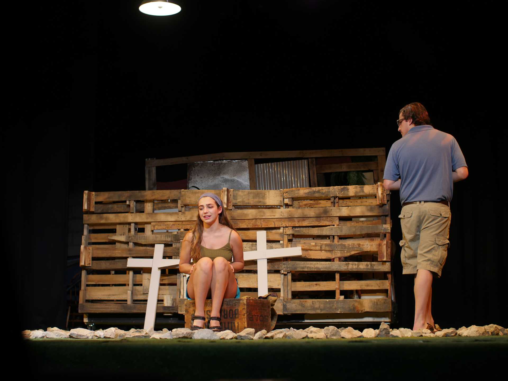 Actors on stage in a scene from Slowgirl.